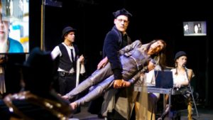 The company of The Wooster Group's "A Pink Chair" at The Performing Garage.