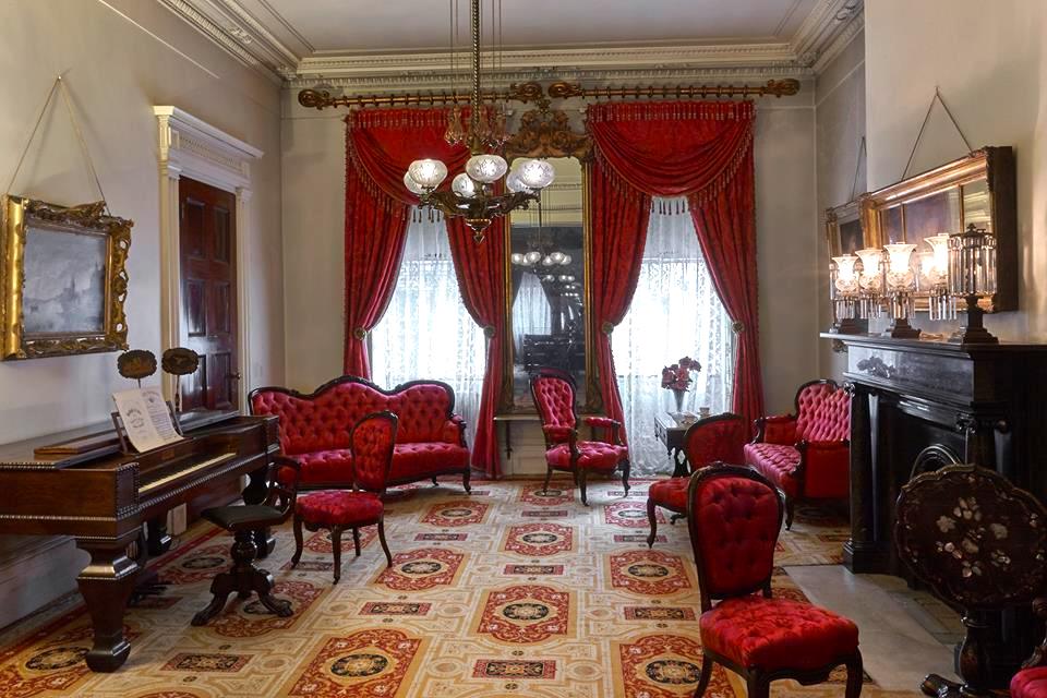 The living room of the Merchant's House Museum, where John Kevin Jones is performing "Killing an Evening with Edgar Allan Poe".