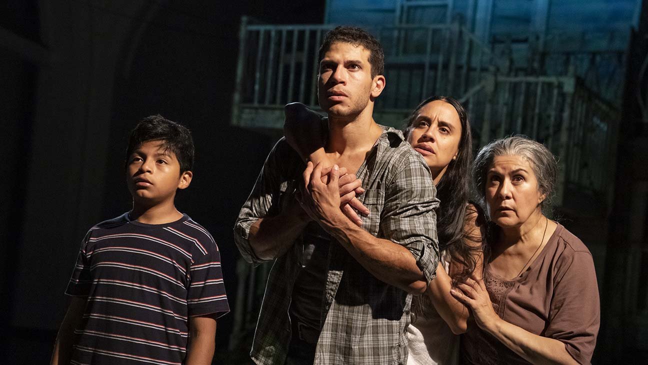 Benjamin Luis McCracken, Alex Hernandez, Sabina Zuniga Valera, and Socorro Santiago in the Public Theater's production of "Mojada" by Luis Alfaro. Photo by Joan Marcus.
