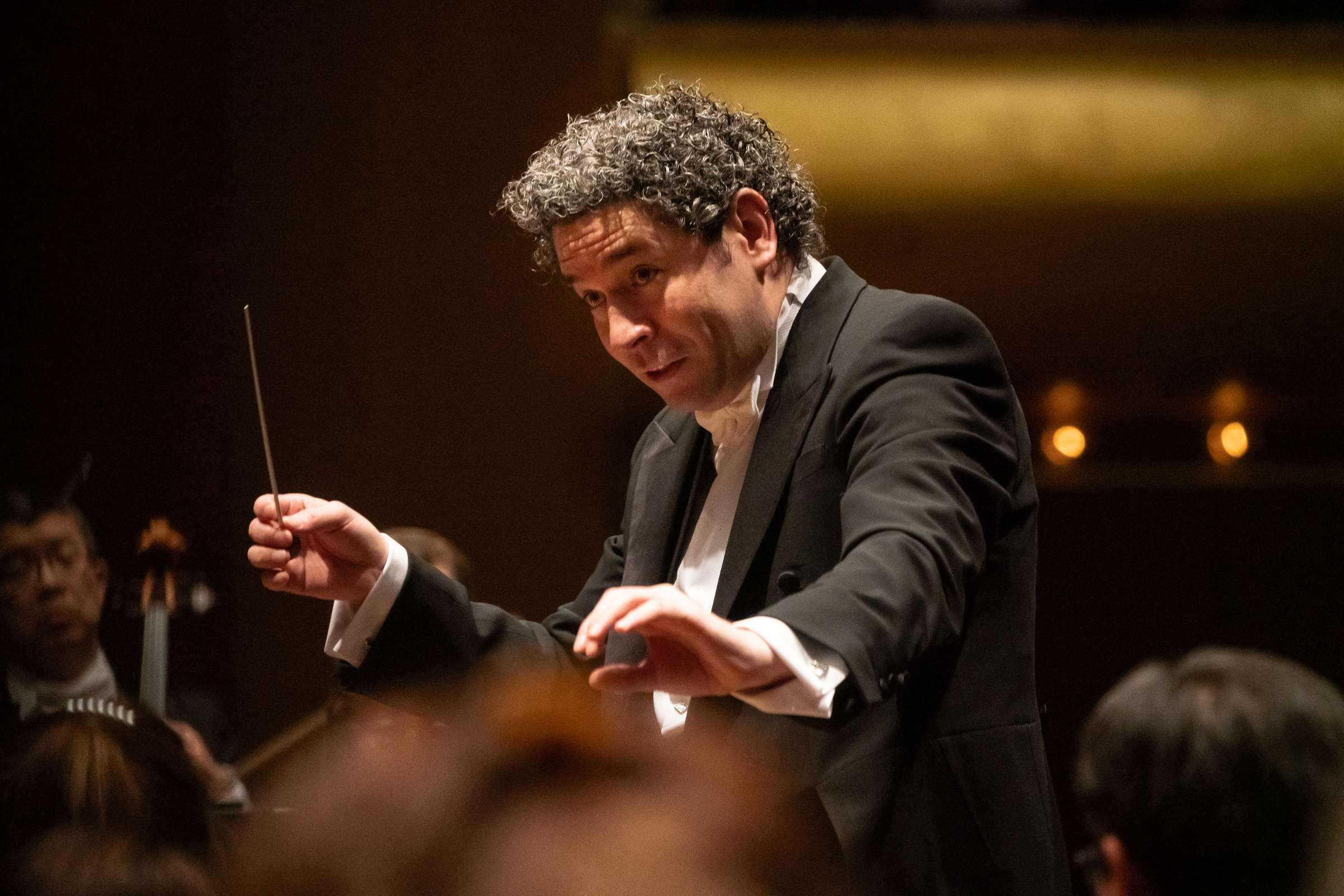 Gustavo Dudamel leads the New York Philharmonic at David Geffen Hall. Photo by Steven Pisano.