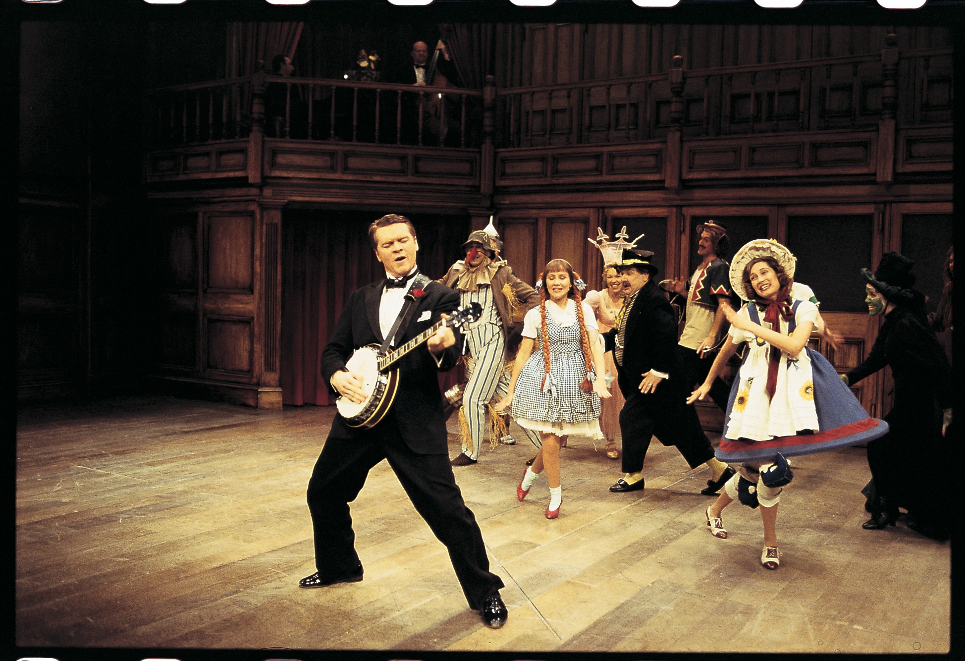 John Scherer leads the company of Andew Lloyd Webber and Alan Ayckbourn's "By Jeeves", circa 2001.